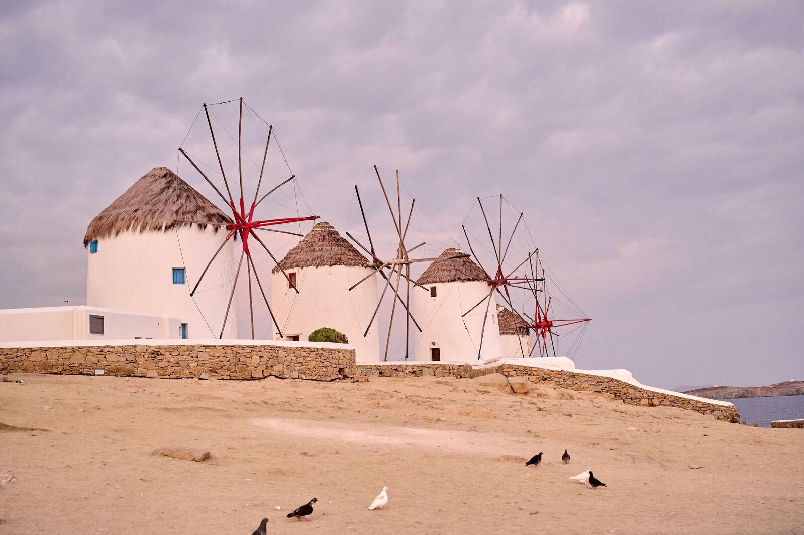 Traditional windmills overlooking the sea on Mykonos, Greece