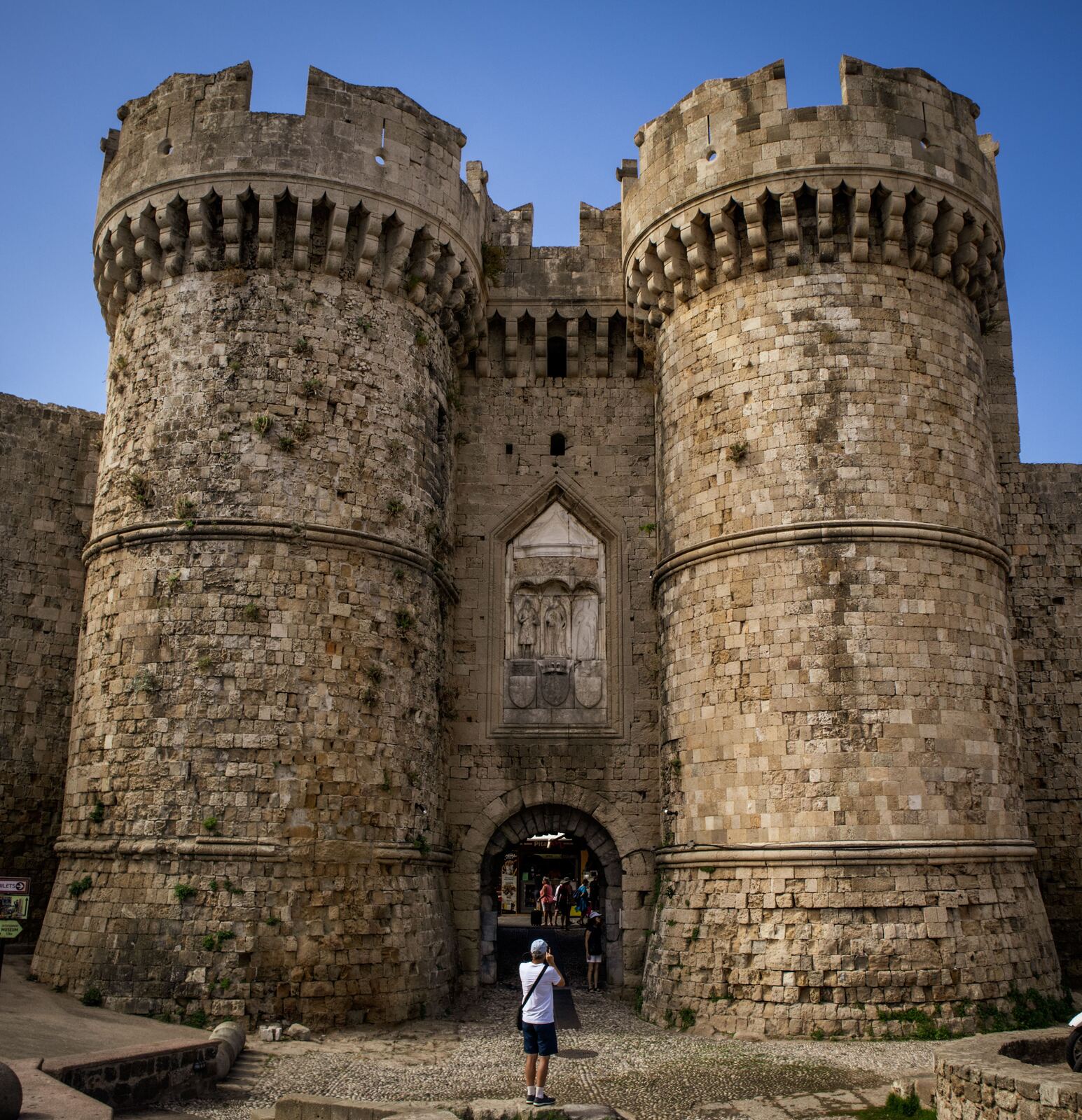 Medieval fortress gate and towers in Rhodes Old Town, Greece